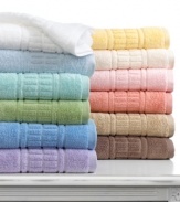 Daily showers become a sumptuous treat with Martha Stewart Collection's Plush bath towel. Featuring ultra-absorbent and fast-drying cotton embellished with a bold, tufted dobby. Choose from a spectrum of cheerful hues.