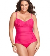 Go ahead, flatter yourself! This chic plus size swimsuit from Miraclesuit flaunts ruching and allover body control for a streamlined look.