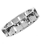 This stainless steel bracelet features laser-engraved logo detail and diamond accents. 18 mm wide; bracelet measures 8-1/2 inches.