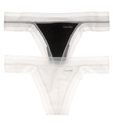 A luxurious cotton thong with intricate lace trim along waistband and legs.