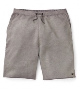 Soak up the sun in these laid back MARC BY MARC JACOBS board shorts with a classic fit and drawstring waistband.