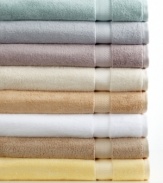 Charm your bath with comfort. This Classic tub mat from Charisma boasts luxurious Egyptian cotton for an ultrasoft hand, offered in a spectrum of  soothing hues.