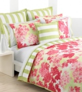 Add a bright bouquet to your Tommy Hilfiger bedding collection with this Cape Cod decorative pillow. A watercolor rendition of hydrangeas in shades of coral are complemented with bright coral merrow stitching along its edges. The reverse features a printed awning stripe, calling to mind the beautiful, carefree textiles of port towns.