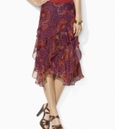 Tiers of ruffles and a sweeping paisley pattern enliven Lauren by Ralph Lauren's fluid silk georgette skirt.