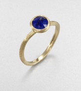 From the Jaipur Resort Collection. A delicate, brushstroke texture distinguishes the band and setting of this stunningly simple ring, topped with a faceted stone of deeply hued, gold-flecked lapis.Lapis18k yellow goldDiameter, about .25Made in Italy