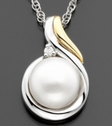 Perfect for pearl lovers, this luminous cultured freshwater pearl (8mm) melds with 14k gold and sterling silver for this beautiful necklace. With round-cut diamond accents and a 18-inch chain. Pendant measures 1/2-inch drop.