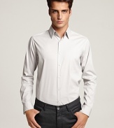 Long sleeve, button front sport shirt with point collar. Clean front, no pockets. Slim fit.