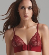 Master the pin-up girl look in this retro-inspired bralette with sheer floral lace cups and large bow accent at front.