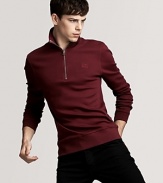 Burberry's sleek 1/2 pullover rendered in an ultrasoft pima cotton for classic comfort and style.