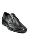 A polished look. This lace-up leather shoe has a clean front and square stitch detail.