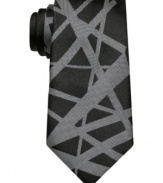 With an evocative pattern, this skinny tie from Bar III gives added edge to the modern man's dress wardrobe.