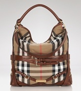 Work Burberry's classic check into your day-to-day look with this slouchy buckle-trimmed canvas hobo. Play up the contemporary edge by teaming it with spray-on leather and a slouchy knits.