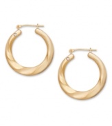 A simple twist on a traditional pair of hoop earrings. Crafted in 14k gold, Signature Gold's™ unique design features a slight cut-out swirl and a sparkling diamond accent. Approximate diameter: 1 inch.