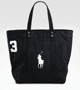 A sporty reincarnation of the iconic polo shirt, this twill cotton tote is adorned with an applied 3 and Ralph Lauren's Big Pony.Zip closureTwo webbed handlesExterior patch pocketApplied twill 3 at the sideAccenting metal grommets at the handles and sidesRoomy interiorReinforced flat bottomCotton canvas14W x 12H x 6DImported