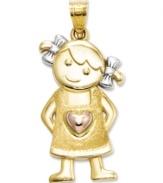 This sweet little girl will brighten your day. Crafted in 14k gold, 14k rose gold and sterling silver, this cute design features a girl with pigtails, ribbons, and overalls accented by a heart. Chain not included. Approximate length: 1-1/5 inches. Approximate width: 1/2 inch.