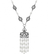 A tassel that's well worth it. Genevieve & Grace's sterling silver pendant features cultured freshwater pearls (4-4-1/2 mm) in a prominent fashion, as well as marcasite to enhance the appeal. Approximate length: 18 inches. Approximate drop: 1-3/4 inches. Approximate drop width: 1-1/8 inches.