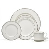 Vows teacups by Lauren by Ralph Lauren Home. Inspired by graceful curves of wedding rings, this elegant dinnerware line features interconnected platinum bands on the finest bone china. Makes a stunning table for any special occasion.