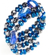 Feel the blues. Shades shine in this coil bracelet from Style&co. Glass beads in blue give this piece an uplifting feel. Approximate length: 7 inches.