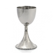 An elegant addition to holidays and Friday night dinners, this Kiddush cup possesses timeless beauty. In the designer's own words, the Molten collection is distinguished by streamlined, timeless shapes... objects which reverberate with the skill of their maker and yet do not fit into a traditional interpretation of craft. The pieces possess a soulfulness and organic energy only possible through the handmade process.