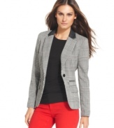 MICHEAL Michael Kors' houndstooth blazer looks extra sharp with elbow patches and buttoned cuffs. Makes an on-trend statement with bold-hued skinny pants.