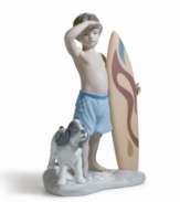 A boy and his best friend appraise the waves on this adorable figurine. Evoking golden days spent on the beach, it's crafted of fine porcelain, with delicate painted hues and a high-gloss finish. Measures 7.5 x 4.5.