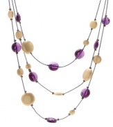 Rich purple and gold disc-shaped beads add a regal look to Kenneth Cole New York's triple-strand lightweight illusion necklace. Crafted in hematite tone mixed metal. Approximate length: 16-1/2 inches + 3-inch extender.