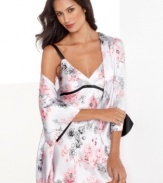 Darling pink and dramatic black meet in the middle with gorgeous effect on this feminine chemise by Jones New York.