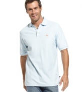 Casual wear meets high technology. This polo shirt from Tommy Bahama wicks moisture for the ultimate in cool comfort.