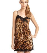 THE LOOKSpirited leopard printAdjustable textured spaghetti strapsLace trimmed neckline and hemSide slits at hemTHE FITAbout 28 from shoulder to hemTHE MATERIALBody: polyesterTrim: 80% nylon/20% spandexCARE & ORIGINMachine washImportedModel shown is 5'11 (180cm) wearing US size Small. 