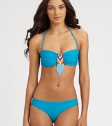 Bohemian beads add exotic charm to this stretch swim design with a convenient, removable halter strap. Removable halter strap ties at neckBandeau topBack clasp closureStretch bottom features beaded sidesFully lined80% nylon/20% spandexHand washImported