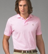 A year-round essential, the iconic polo in soft mercerized pima cotton has a gentle fit for the ultimate in comfort. Mercerized yearns for smooth hand and subtle luster Two-button placket Ribbed polo collar and armbands Multi-color polo detail at chest Silk grosgrain taping at split hem Machine wash Imported