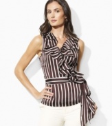 Elegantly pairing a soft cascade of ruffles with slimming stripes, the sleeveless Lauren by Ralph Lauren blouse is tailored in a feminine wrap silhouette from floaty satin-faced georgette.