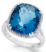 A solo standout, this chunky cocktail ring features a vibrant, cushion-cut London blue topaz (9-3/8 ct. t.w.) edged by round-cut diamonds (1/5 ct. t.w.). Set in 14k white gold.