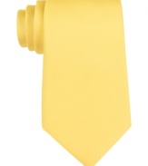 Create a singular style with the solid bright statement of this tie from Tommy Hilfiger.