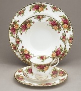 This popular bone china pattern surrounds blooming sprays of colorful English roses with hand-applied bands of 22K gold. Safe for use in the dishwasher, oven and freezer. Manufacturer's two-year warranty.