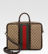 GG fabric briefcase with signature web detail. Double zip top closure with lock Double handles Adjustable, detachable shoulder strap Red/green/red signature web Light gold hardware Interior zip, cell phone and PDA pockets Padded laptop compartment with tab snap 2.4W X 12.2H X 16.5L Made in Italy 