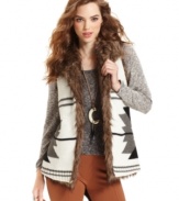 Bar III's cozy vest features faux-fur trim and a graphic pattern for a fashion-forward look with a rugged edge.