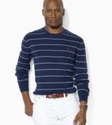 A versatile crewneck sweater is rendered in ultra-soft Pima cotton and accented with sleek stripes and Ralph Lauren's embroidered pony for a refined finish.