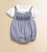 Keep baby soft and snug in this versatile bodysuit with a pretty, embroidered collar.Embroidered crewneckShort cap sleevesBack snapsBottom snaps95% cotton/5% elastaneMachine washImported Please note: Number of snaps may vary depending on size ordered. 