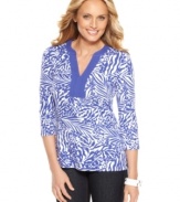 Charter Club outfits this three-quarter sleeve top with a bright fern and floral print and a contrasting solid trim at the neckline.