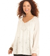 Be a bohemian beauty in Lucky Brand Jeans' plus size peasant top, accented by charming cutouts.