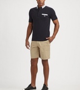 A classic cotton polo with a front patch pocket and seersucker trim. Three-button placketFront patch pocketEmbroidered signature logo on chestCottonMachine washImported