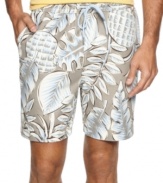 Blend into your tropical surrounding with these floral print swim trunks from Tommy Bahama.