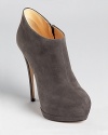 Supple grey suede stakes its claim on a sky-high bootie from Giuseppe Zanotti.