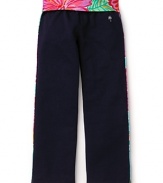 A floral print fold-over waistband and piping adds a playful pop of color to these breezy Lilly Pulitzer pants. Pair it with the matching Lilly Pulitzer Girls' Brigit hoodie for effortless downtime cool.