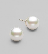 Simple and lovely, classic studs of lustrous white pearls to wear anywhere. 12mm organic man-made pearls 14k gold 14k gold post back Made in Spain