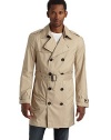 Lightweight and packable, this double breasted trench classic folds into itself and features water resistant fabric construction so you can brave the elements in style.Point collar with hook-and-eye Epaulettes Double breasted button front Single gun flap Long sleeves with belted cuffs Dual side pocketsBuckled belt Storm flap One inside zip pocket Fully lined About 35½ from shoulder to hem Polyester; hand wash Imported