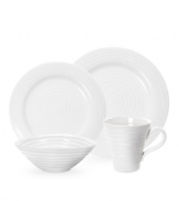 The pristine porcelain of this place settings collection lends your tabletop a clean, modern sensibility, while the textured pattern adds hand-thrown appeal.