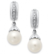 A class act. These elegant earrings feature cultured freshwater pearls (7-7-1/2 mm) with sparkling diamond accents for extra shine. Set in sterling silver. Approximate length: 7/8 inch. Approximate width: 1/4 inch.