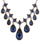 2028 is feeling blue, but in a good way. This bib necklace is crafted from copper-tone mixed metal and adorned with stunning blue stone teardrop accents. Approximate adjustable length: 16 inches + 3-inch extender. Approximate drop: 2-1/2 inches.